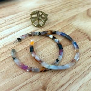 Multicolored earrings and Peace Sign ring